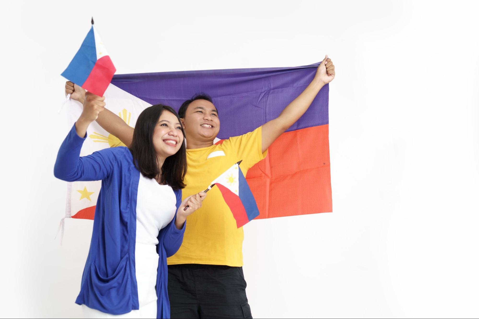 Couple Holding Flag Celebrating